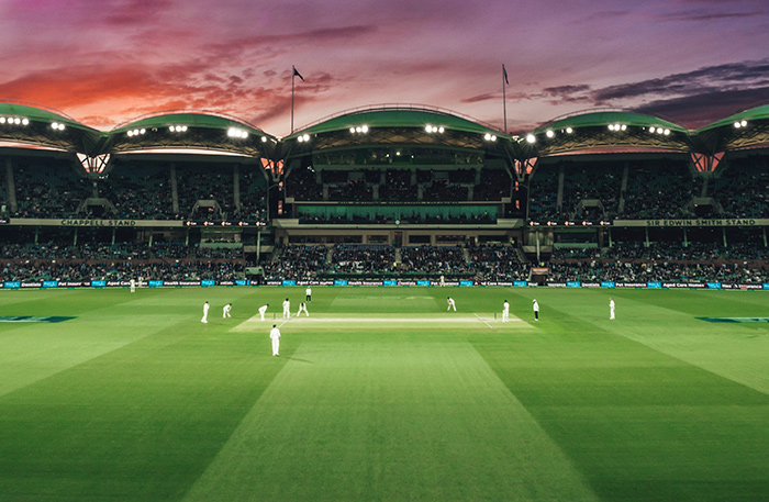 Cricket match at sunset